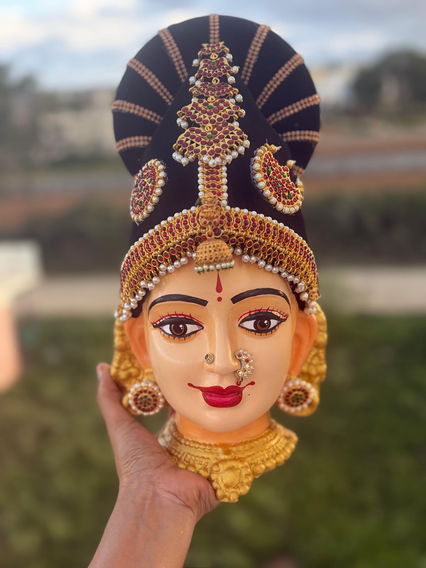 Tanjore Ammavaru face